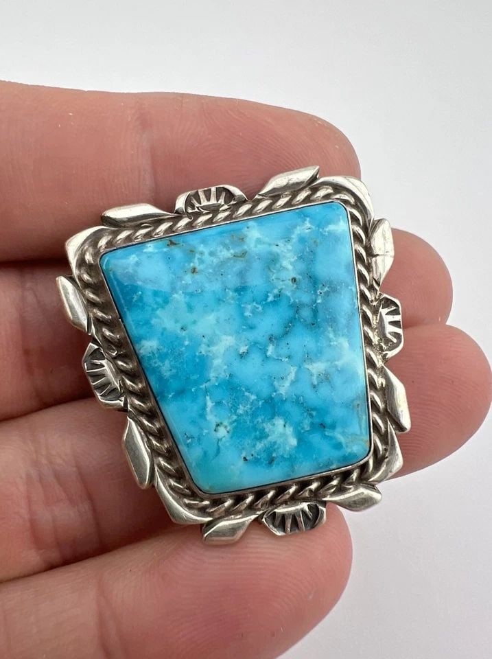 BILLIE EAGLE NAVAJO STERLING SILVER BIRDSEYE KINGMAN TURQUOISE STAMPED BOLO TIE: BILLIE EAGLE NAVAJO STERLING SILVER BIRDSEYE KINGMAN TURQUOISE STAMPED BOLO TIE Vtg Billie Eagle Navajo Sterling Silver Webbed Birdseye Kingman Turquoise Stamped Bolo Tie Size: 1 3/8" Tall by 1 3/8" W