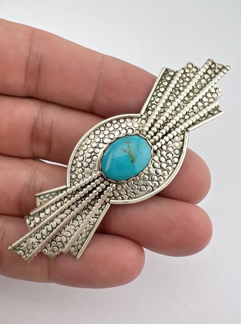 VINTAGE NAVAJO STERLING SILVER KINGMAN TURQUOISE STAMPED LONG PIN BROOCH 3 1/8": VINTAGE NAVAJO STERLING SILVER KINGMAN TURQUOISE STAMPED LONG PIN BROOCH 3 1/8" Vintage Navajo Sterling Silver Kingman Turquoise Stamped Long Pin Brooch 3 1/8" Size: 1" Tall by Over 3" Wide Metal: Ste
