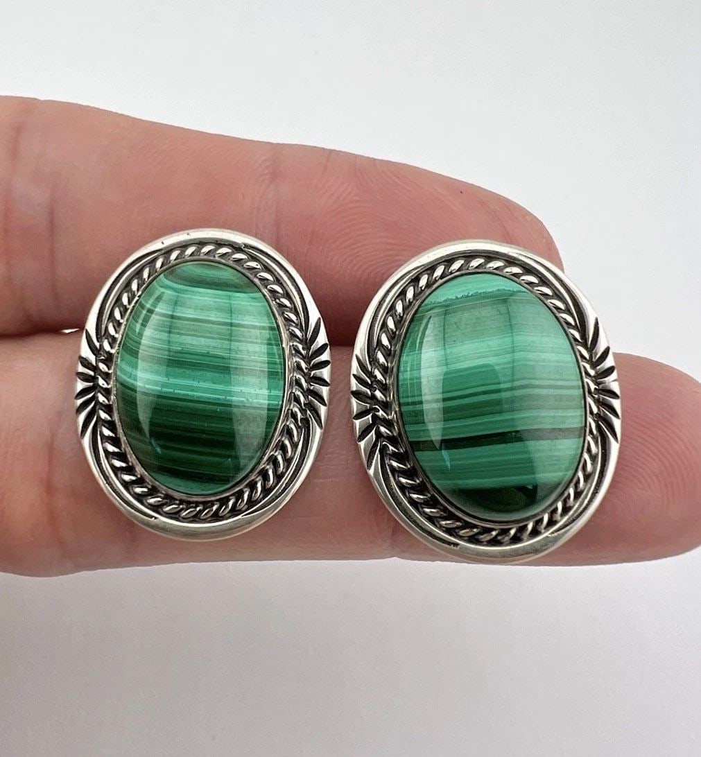 VINTAGE WILL DENETDALE NAVAJO STERLING SILVER MALACHITE OVAL POST EARRINGS: VINTAGE WILL DENETDALE NAVAJO STERLING SILVER MALACHITE OVAL POST EARRINGS Vintage Will Denetdale Navajo Sterling Silver Malachite Oval Post Earrings Size: 1" Tall & 7/8" Wide Weight is 11.4 Grams on 