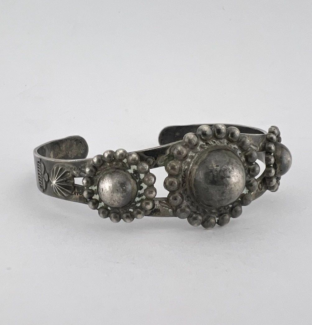 OLD NAVAJO FRED HARVEY ERA STERLING SILVER STAMPED BALL CUFF BRACELET: OLD NAVAJO FRED HARVEY ERA STERLING SILVER STAMPED BALL CUFF BRACELET Old Navajo Fred Harvey Era Sterling Silver Stamped Ball Cuff Bracelet Cuff is Around 5 1/4" tip to Tip and has an Around 1" Wide -