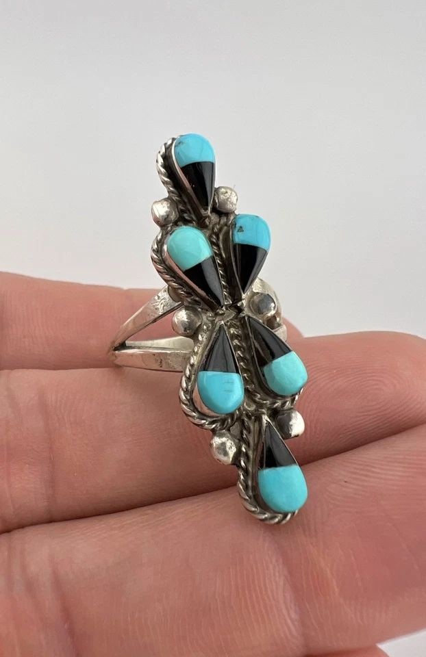 VINTAGE ZUNI STERLING SILVER TURQUOISE & BLACK JET CLUSTER LONG RING 1.5": VINTAGE ZUNI STERLING SILVER TURQUOISE & BLACK JET CLUSTER LONG RING 1.5" Vintage Zuni Sterling Silver Turquoise & Black Jet Cluster Long Ring 1.5" Size: 6.5 - Can Be re Sized Weight is 6.4 Grams on m