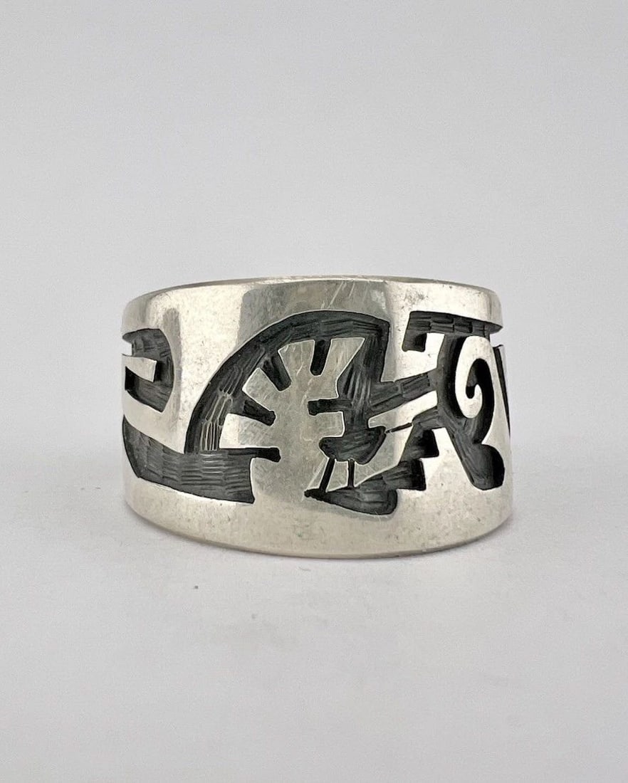 VINTAGE HOPI STERLING SILVER TRIBAL OVERLAY DESIGN WIDE MEN'S RING: VINTAGE HOPI STERLING SILVER TRIBAL OVERLAY DESIGN WIDE MEN'S RING Vintage Hopi Sterling Silver Tribal Overlay Design Wide Men's Ring Ring Size: 12.5 - Can Be Re Sized Weight is 8.6 Grams on my scale 