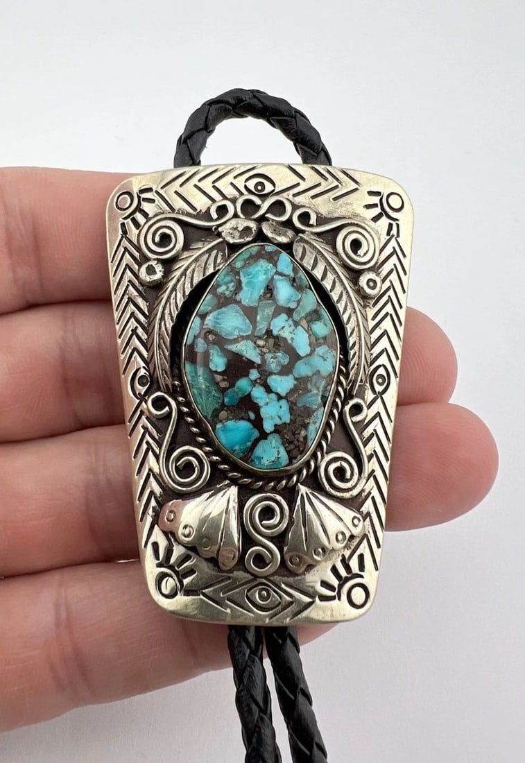 VINTAGE NAVAJO NICKEL SILVER BLUE SPIDERWEB TURQUOISE STAMPED BOLO TIE 2.25": VINTAGE NAVAJO NICKEL SILVER BLUE SPIDERWEB TURQUOISE STAMPED BOLO TIE 2.25" Vintage Navajo Nickel Silver Blue Spiderweb Turquoise Stamped Bolo Tie 2.25" Size: 2 1/4" Tall by 1 5/8" Wide at The Top We