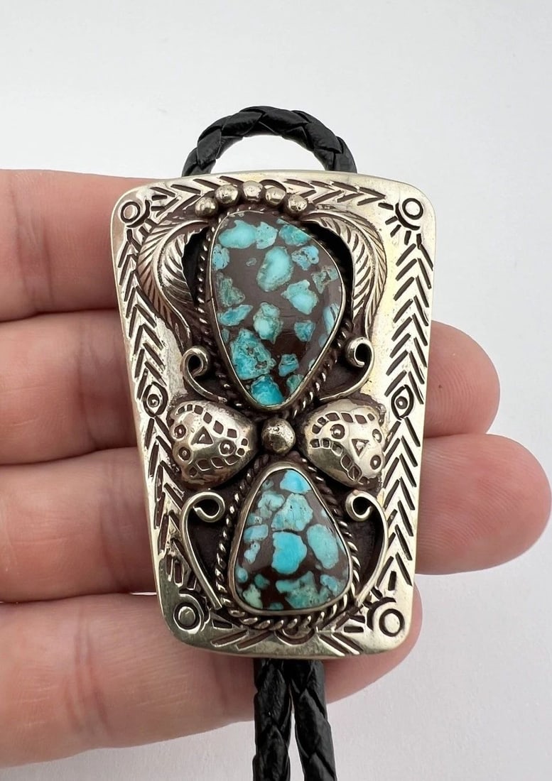 VINTAGE NAVAJO NICKEL SILVER BLUE SPIDERWEB TURQUOISE STAMPED BOLO TIE 2.25": VINTAGE NAVAJO NICKEL SILVER BLUE SPIDERWEB TURQUOISE STAMPED BOLO TIE 2.25" Vintage Navajo Nickel Silver Blue Spiderweb Turquoise Stamped Bolo Tie 2.25" Size: 2 1/4" Tall by 1 5/8" Wide at The Top We