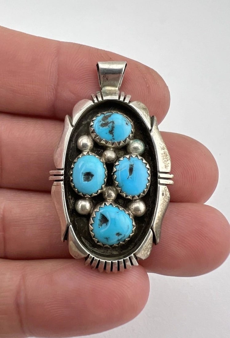 VTG NAVAJO STERLING SILVER SLEEPING BEAUTY TURQUOISE STAMPED PENDANT 1 5/8": VTG NAVAJO STERLING SILVER SLEEPING BEAUTY TURQUOISE STAMPED PENDANT 1 5/8" Vtg Navajo Sterling Silver Sleeping Beauty Turquoise Stamped Pendant 1 5/8" Size: 1 5/8" Tall With Bail & 1" Wide Weight is 