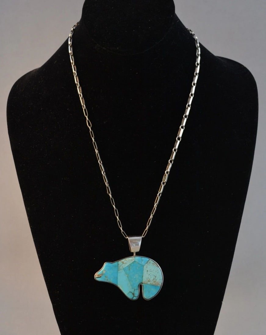 NAVAJO SILVER NECKLACE - DOUBLE SIDED 2" BEAR PENDANT - TURQUOISE & INLAY - 21": NAVAJO SILVER NECKLACE - DOUBLE SIDED 2" BEAR PENDANT - TURQUOISE & INLAY - 21" This sterling silver pendant necklace has been beautifully crafted. The large 2" x 2" pendant has wonderful multi-stone 