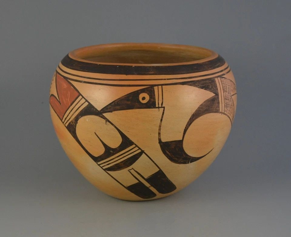 LAURA CHAPELLA TOMOSIE 1907-1981- OLD VINTAGE HOPI POT-7 1/2 " PARROT DESIGN: LAURA CHAPELLA TOMOSIE 1907-1981- OLD VINTAGE HOPI POT-7 1/2 " PARROT DESIGN This old Hopi pot was made by Hopi Tewa potter Laura Chapella Tomosie (1907-1981). It shows a wonderful parrot wing design.