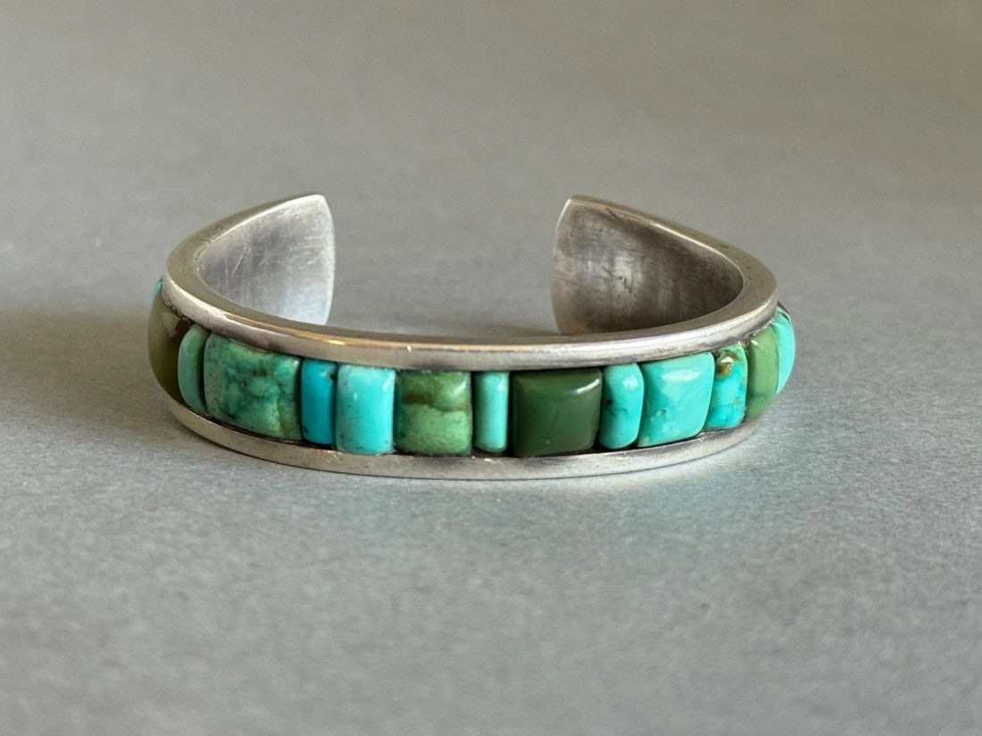 OLD PAWN NAVAJO STERLING SILVER AND TURQUOISE BRACELET. (1 of 2)