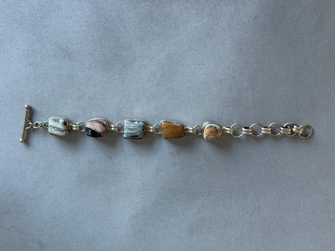 UNUSED VINTAGE NAVAJO STERLING SILVER AND MAMMOTH TOOTH ADJUSTABLE BRACELET (1 of 1)