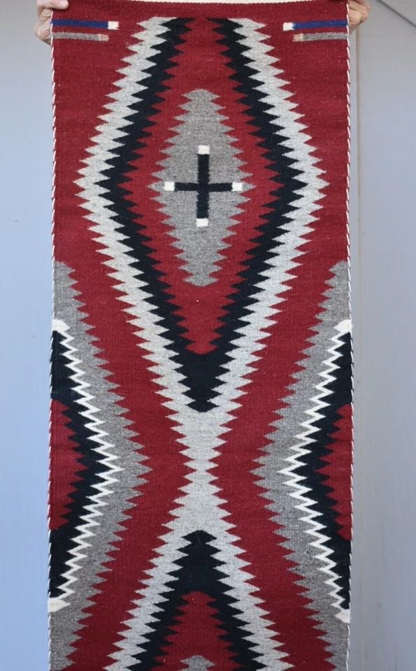 NAVAJO GANADO RUG - LONG RUNNER - SERRATED DIAMOND CROSS DESIGN - 63" X 19": NAVAJO GANADO RUG - LONG RUNNER - SERRATED DIAMOND CROSS DESIGN - 63" X 19" This Ganado Navajo rug is a long runner size. It has been woven of soft wools. It shows a great diamond design with crosses.