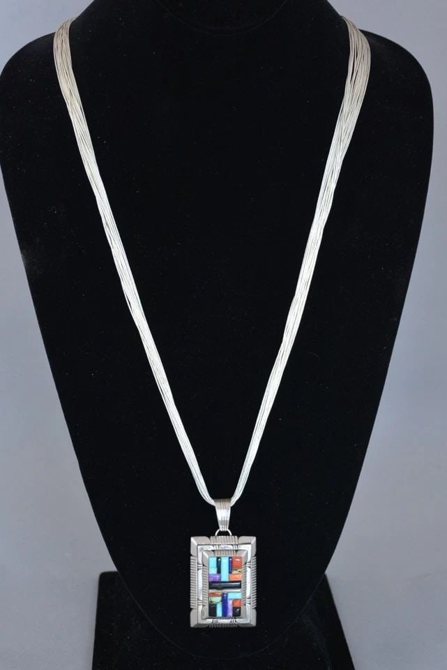 E. KEE - NAVAJO LG MOSAIC INLAY PENDANT ON 30" LIQUID SILVER 18 STRAND NECKLACE: E. KEE - NAVAJO LG MOSAIC INLAY PENDANT ON 30" LIQUID SILVER 18 STRAND NECKLACE This pendant necklace has been beautifully crafted by Navajo silversmith E. Kee. It is hallmarked E. Kee and with the TS