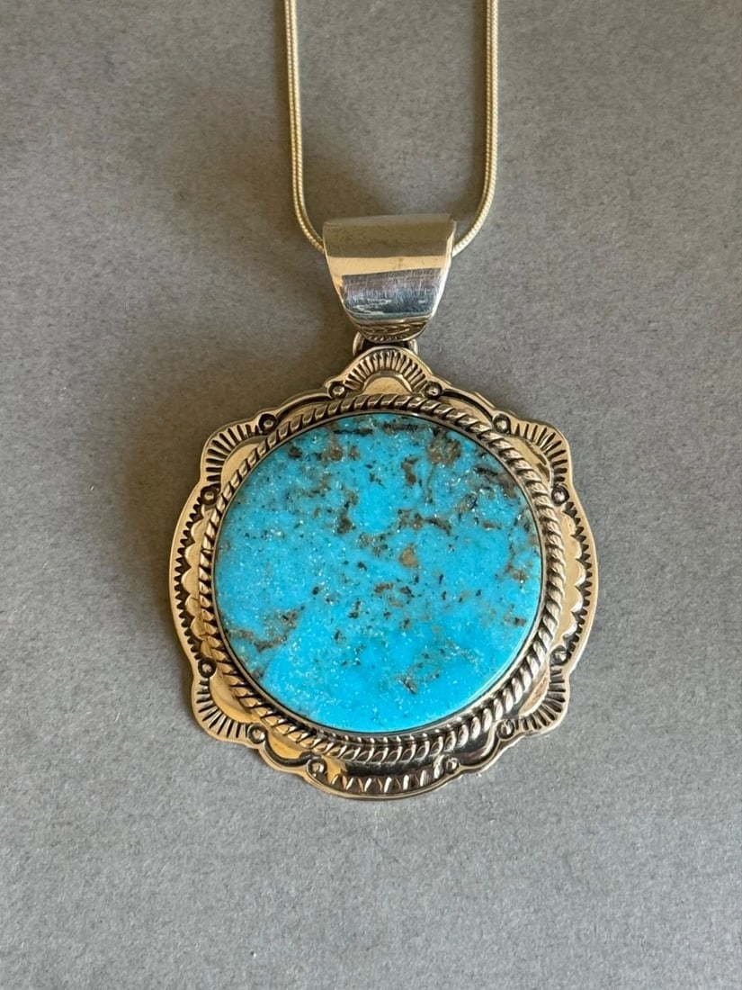 UNUSED LARGE NAVAJO STERLING SILVER AND TURQUOISE PENDANT ON CHAIN J PIASO JR: UNUSED LARGE NAVAJO STERLING SILVER AND TURQUOISE PENDANT ON CHAIN J PIASO JR Unused Large Navajo Sterling Silver and Turquoise Pendant on Sterling Silver Chain. Handmade by J. Piaso Jr. 2 1/8" tall .