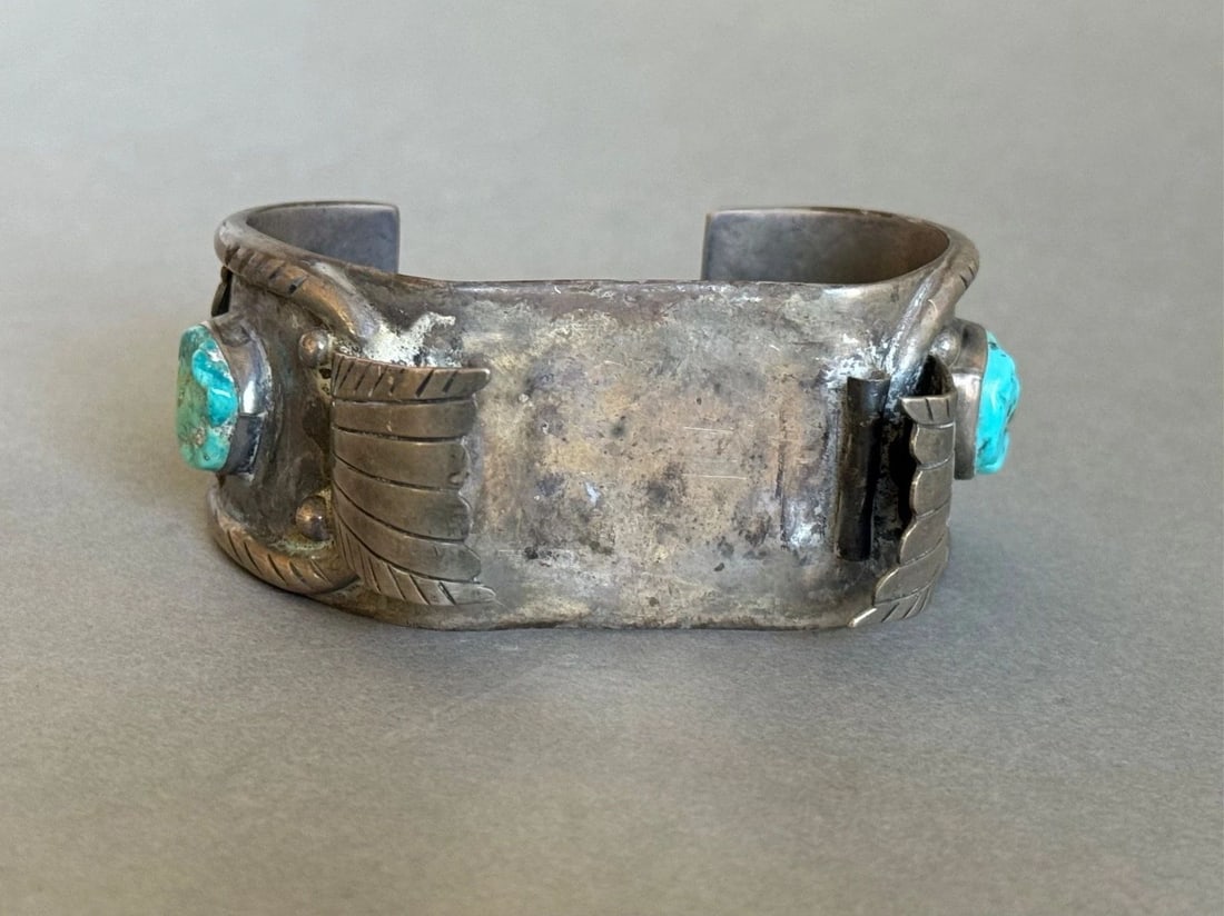 OLD PAWN NAVAJO STERLING SILVER AND TURQUOISE WATCH BRACELET. 88 GRAMS: OLD PAWN NAVAJO STERLING SILVER AND TURQUOISE WATCH BRACELET. 88 GRAMS Old Pawn Navajo Sterling Silver and Turquoise Watch Bracelet. 1 1/8" Wide .. 5 5/8" Inside with a 1 3/8" Opening