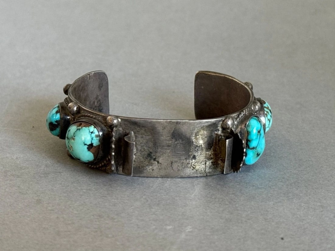 OLD PAWN NAVAJO STERLING SILVER AND TURQUOISE WATCH BRACELET 58 GRAMS: OLD PAWN NAVAJO STERLING SILVER AND TURQUOISE WATCH BRACELET 58 GRAMS Old Pawn Navajo Sterling Silver and Turquoise Watch Bracelet. 3/4" Wide ..5 1/4" Inside with a 1 1/4" opening ..