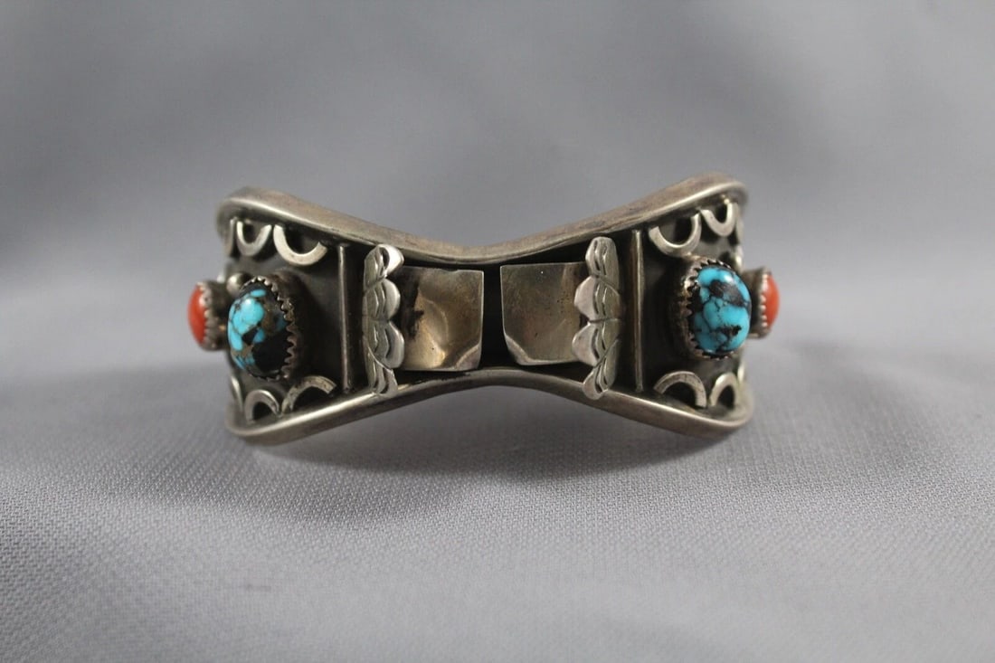 OLD PAWN NAVAJO TURQUOISE AND CORAL WATCH BRACELET: OLD PAWN NAVAJO TURQUOISE AND CORAL WATCH BRACELET Item Description: Widest Point 1 1/8 " ..4 7/8 " Inside with a 1" opening .. Nice Stones.. 1 .6 Oz..