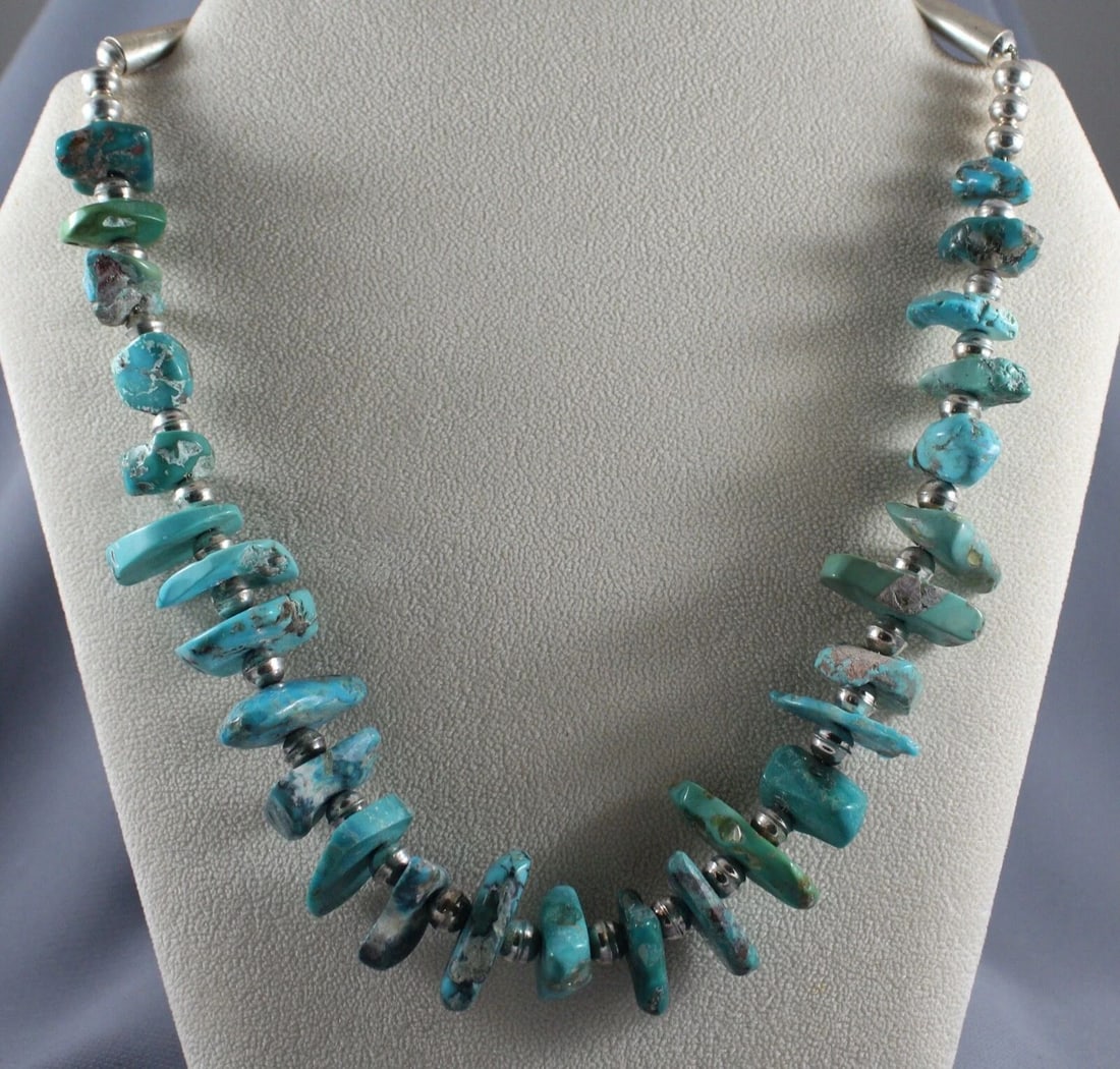 OLD PAWN NAVAJO TURQUOISE AND SILVER NECKLACE: OLD PAWN NAVAJO TURQUOISE AND SILVER NECKLACE Item Description: 21 1/2 " Long Turquoise is 1/2 " to 1 1/8 " Sterling Tips and Beads..