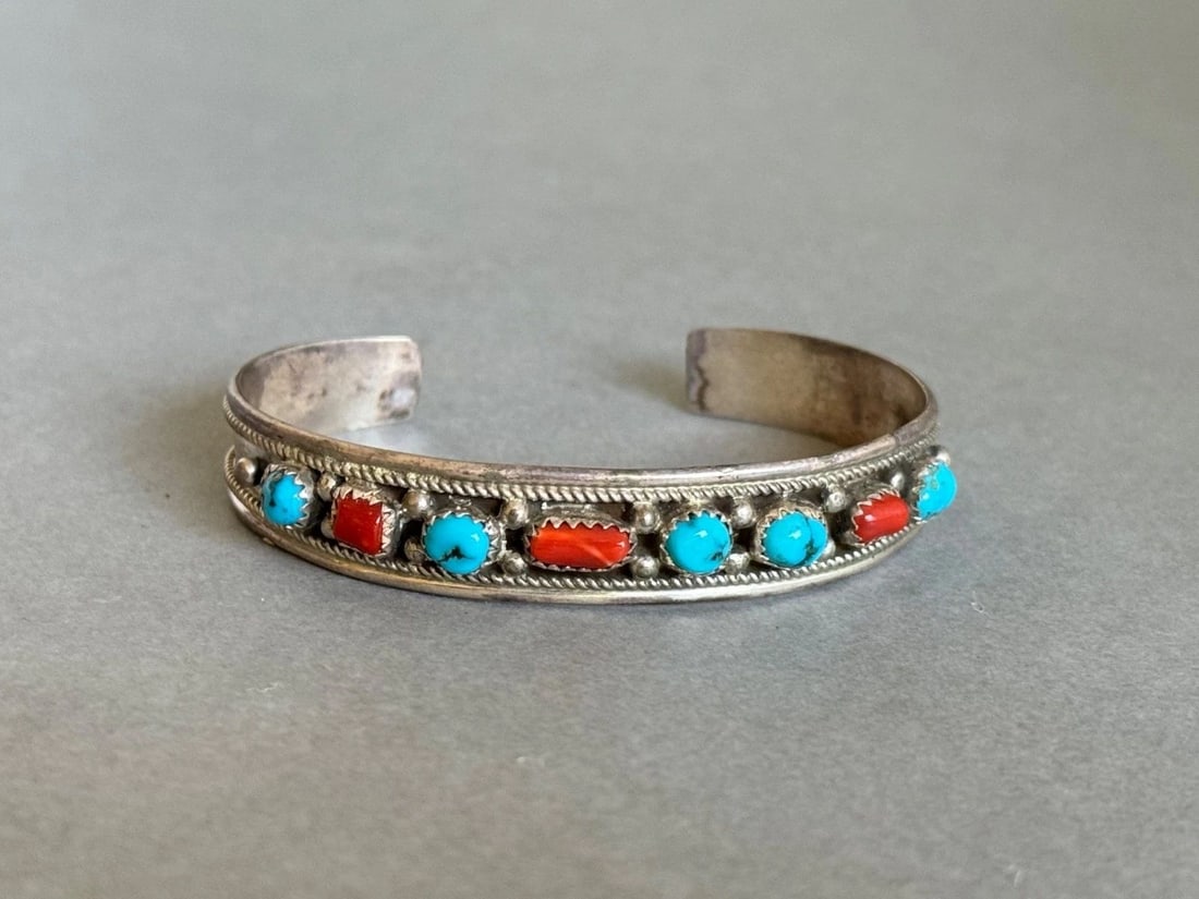 VINTAGE NAVAJO STERLING SILVER WITH TURQUOISE AND CORAL BRACELET. (1 of 2)
