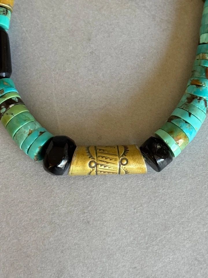 OLD SANTO DOMINGO PUEBLO TURQUOISE NECKLACE WITH JET AND COPPER: OLD SANTO DOMINGO PUEBLO TURQUOISE NECKLACE WITH JET AND COPPER Old Santo Domingo Pueblo Turquoise Necklace with Jet and Copper .. Copper loops on old string .. Hand Stamped ..19" Turquoise Beads 3/16
