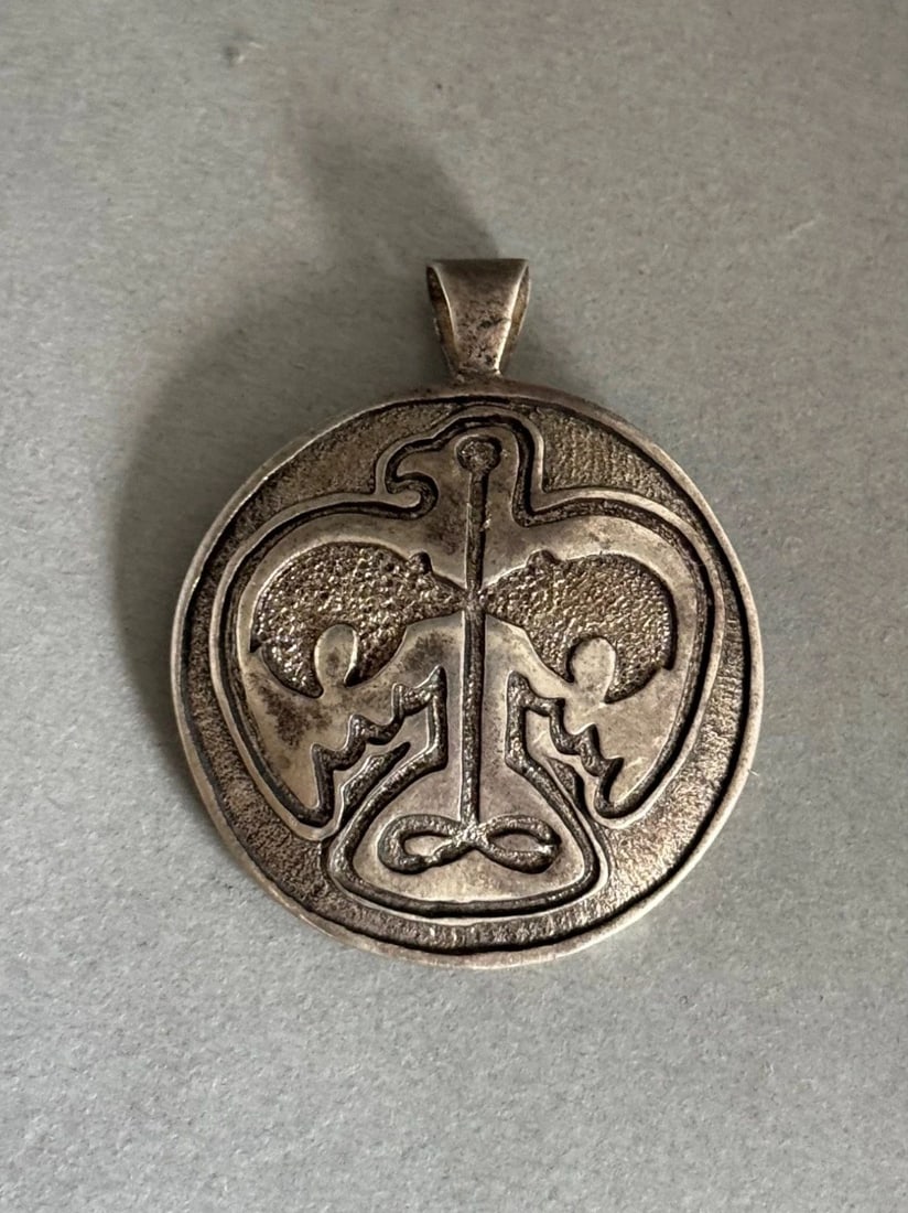 OLD PAWN NAVAJO TUFA CAST SILVER EAGLE AND BEARS PENDANT: OLD PAWN NAVAJO TUFA CAST SILVER EAGLE AND BEARS PENDANT Old Pawn Navajo Tufa Cast Silver Eagle and Bears Pendant ..1 3/4" Tall ..16.7 Grams