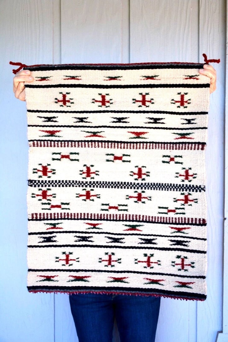 VINTAGE NAVAJO RUG - BANDED DESIGN WITH CROSSES - WHITE RED GREEN BLACK 28 X 21: VINTAGE NAVAJO RUG - BANDED DESIGN WITH CROSSES - WHITE RED GREEN BLACK 28 X 21 Item Description: This vintage Navajo rug has a banded pattern with crosses and hour glass figures. The colors are deep 