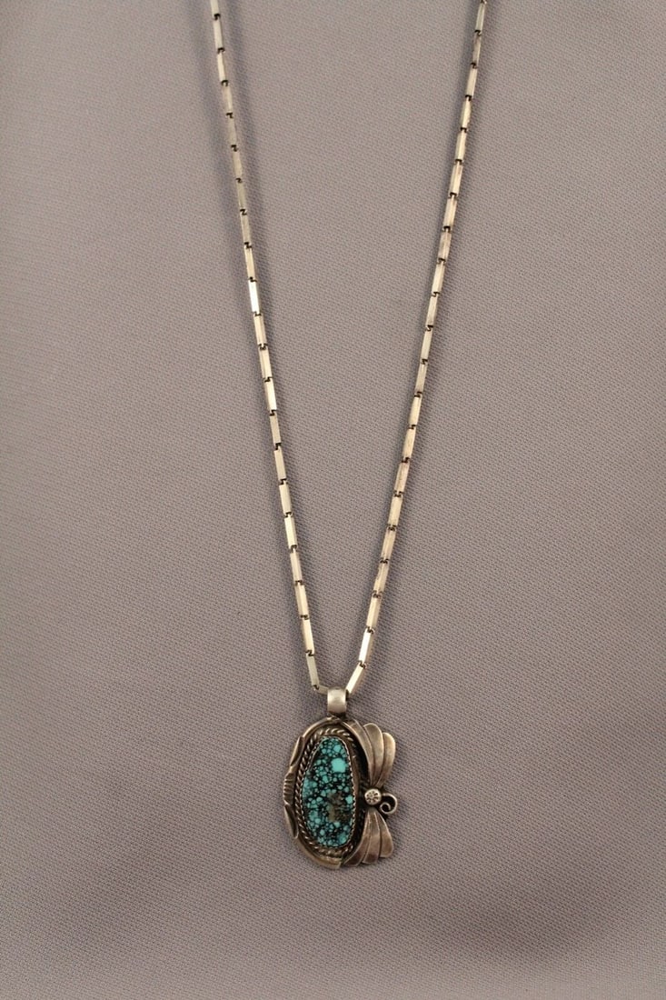 VINTAGE NAVAJO OR SANTO DOMINGO GREAT TURQUOISE PENDANT.. SIGNED ..: VINTAGE NAVAJO OR SANTO DOMINGO GREAT TURQUOISE PENDANT.. SIGNED .. Item Description: Pendant 1 1/2” Tall 1” width Great Turquoise Comes with Sterling Chain