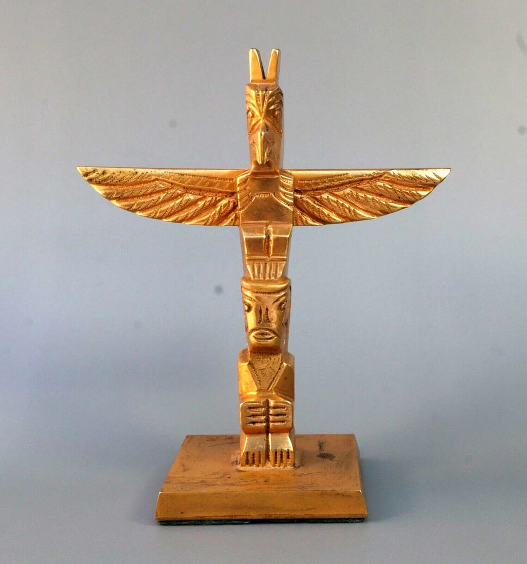 RALPH WILSON -NORTHWEST COAST-FIRST NATION-TOTEM POLE.. METAL WITH GOLD FINISH: RALPH WILSON -NORTHWEST COAST-FIRST NATION-TOTEM POLE.. METAL WITH GOLD FINISH Item Description: Totem Pole Metal with Gold finish done by Ralph Wilson of Alaska 4 1/4" Tall with Stand x 3 1/2" Wide w