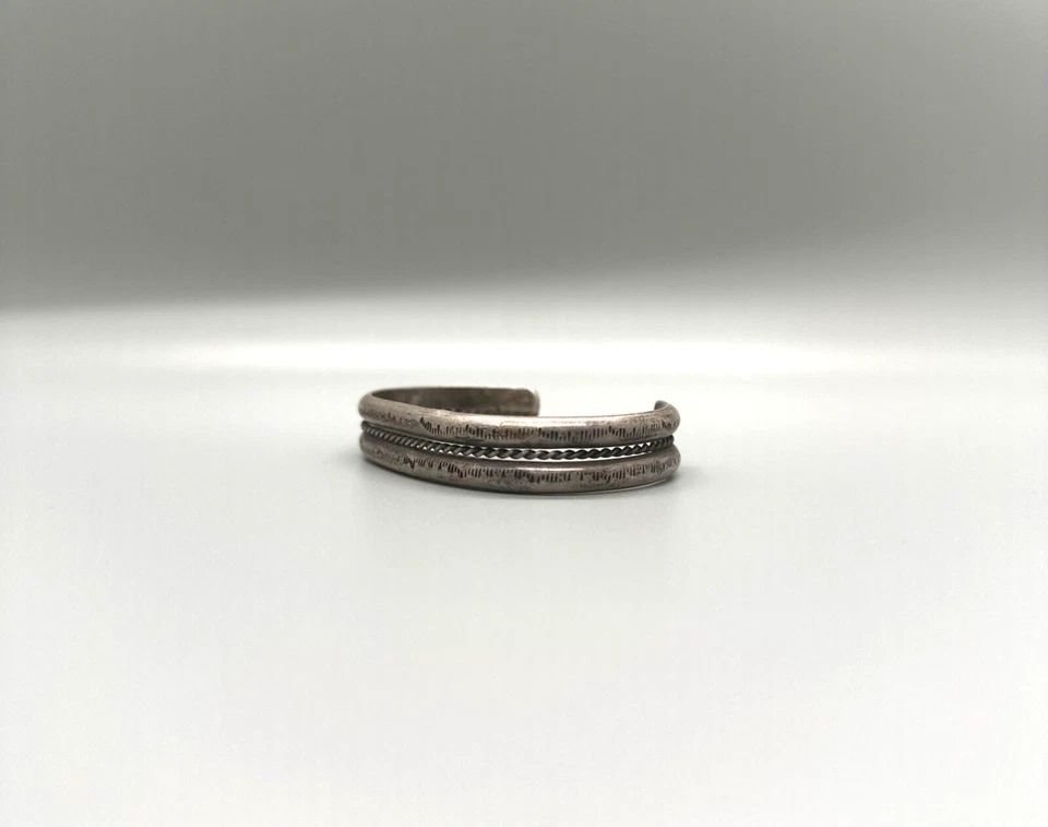 OLD PAWN NAVAJO STERLING SILVER BRACELET: OLD PAWN NAVAJO STERLING SILVER BRACELET Item Description: Old Navajo Bracelet 1/2 " Tall 5 1/4 Inside with a 1 1/4 " Opening.. P