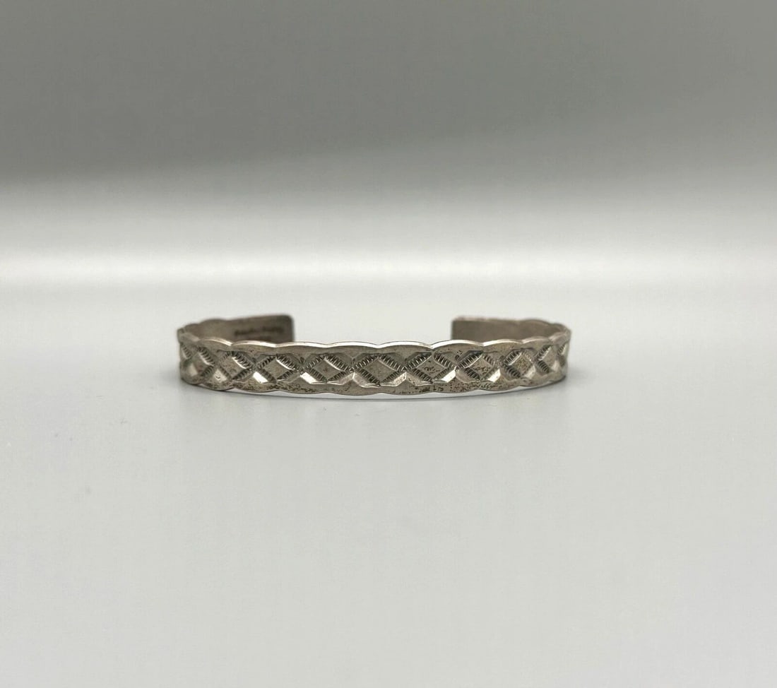 VINTAGE NAVAJO STERLING SILVER BRACELET SIGNED DOUGLAS CTAITTY?: VINTAGE NAVAJO STERLING SILVER BRACELET SIGNED DOUGLAS CTAITTY? Item Description: 3/8 " Wide ..5 7/8 " Inside with a 1 1/8 " Opening P