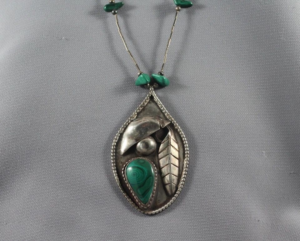 OLD PAWN NAVAJO STERLING SILVER AND MALACHITE AND TURQUOISE NECKLACE: OLD PAWN NAVAJO STERLING SILVER AND MALACHITE AND TURQUOISE NECKLACE Item Description: pendant 2 3/4 " tall 1 1/2 wide Silver chain is 24" long