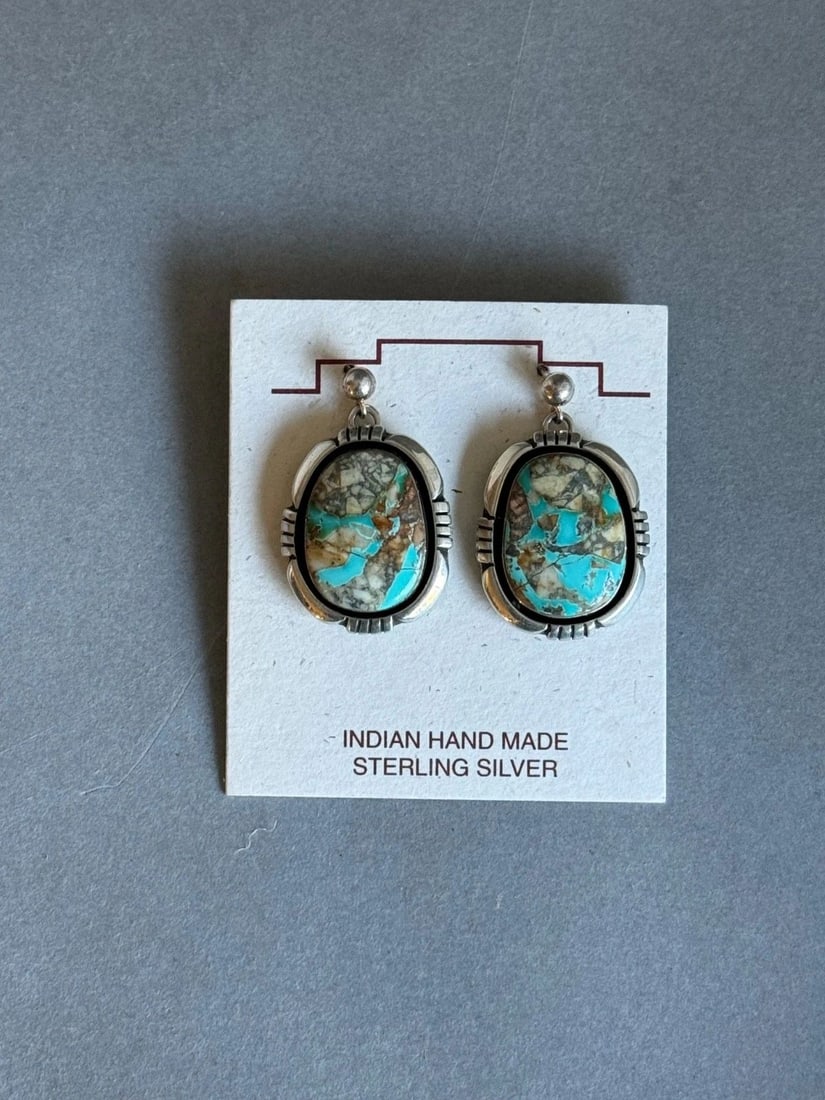 NAVAJO STERLING SILVER WITH NATURAL OJO TURQUOISE EARRINGS 1 1/8" DROP: NAVAJO STERLING SILVER WITH NATURAL OJO TURQUOISE EARRINGS 1 1/8" DROP Navajo Sterling Silver with Natural Turquoise Earrings. Turquoise is from Ojo Arizona, private mine. Signed D