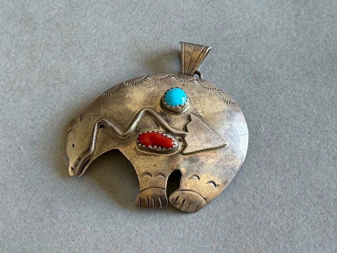 VINTAGE NAVAJO STERLING SILVER HEARTLINE BEAR PENDANT WITH TURQUOISE AND CORAL: VINTAGE NAVAJO STERLING SILVER HEARTLINE BEAR PENDANT WITH TURQUOISE AND CORAL Vintage Navajo Sterling Silver Heartline Bear Pendant with Turquoise and Coral 1 3/4" Tall x 1 7/8” Wide