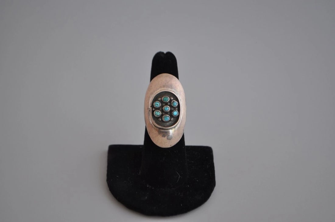 OLD PAWN NAVAJO STERLING SILVER AND TURQUOISE RING SIZE 6 1/4: OLD PAWN NAVAJO STERLING SILVER AND TURQUOISE RING SIZE 6 1/4 Item Description: Weight 9.36 Grams 1 1/2 " Tall