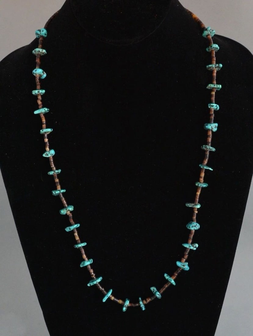 VINTAGE NAVAJO TURQUOISE WITH HEISHI SHELL NECKLACE - 25 1/2" LONG: VINTAGE NAVAJO TURQUOISE WITH HEISHI SHELL NECKLACE - 25 1/2" LONG This vintage Navajo necklace has turquoise beads alternating with heishi shell beads. The necklace is 25.5" long. The turquoise beads