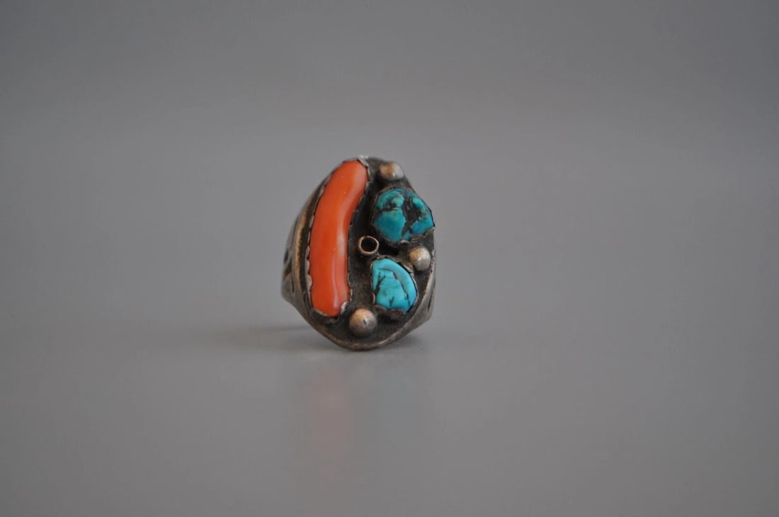 OLD PAWN NAVAJO STERLING SILVER RING - TURQUOISE CORAL SIZE 8 3/4: OLD PAWN NAVAJO STERLING SILVER RING - TURQUOISE CORAL SIZE 8 3/4 Weight 13.35 Grams 1 1/8 " Tall Old Pawn Jewelry dates from the early 1900s to the 1970s. Most of it is not signed because it wasn't t