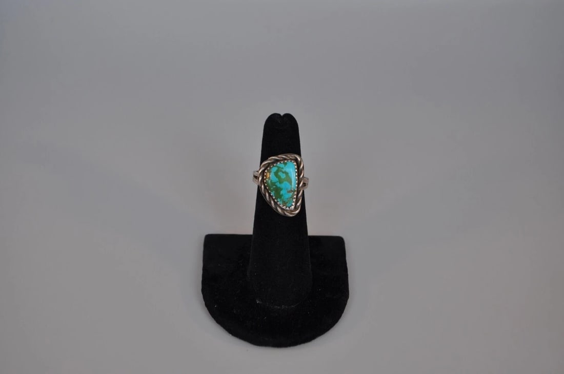 OLD PAWN NAVAJO STERLING SILVER RING - TURQUOISE SIZE 4 1/2: OLD PAWN NAVAJO STERLING SILVER RING - TURQUOISE SIZE 4 1/2 Weight 6.31 Grams 7/8" Tall Old Pawn Jewelry dates from the early 1900s to the 1970s. Most of it is not signed because it wasn't the Native 