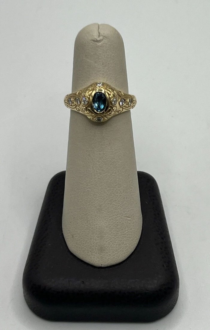 14KT YELLOW GOLD, DIAMOND & BLUE TOPAZ RING SIZE 6.75: 14KT YELLOW GOLD, DIAMOND & BLUE TOPAZ RING SIZE 6.75 14KT YELLOW GOLD, DIAMOND & BLUE TOPAZ RING SIZE 6.75 This stunning ring is made of 14k yellow gold and features a combination of blue topaz and d