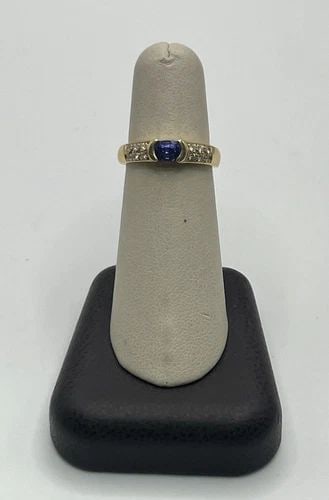 14KT YELLOW GOLD, DIAMOND, TANZANITE RING SIZE 6.25: 14KT YELLOW GOLD, DIAMOND, TANZANITE RING SIZE 6.25 14KT YELLOW GOLD, DIAMOND, TANZANITE RING SIZE 6.25 This beautiful ring is made of 14k yellow gold and features a stunning tanzanite stone, with a s