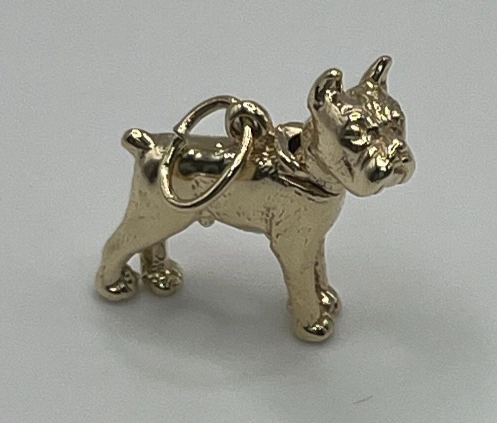 14K YELLOW GOLD BULLDOG CHARM: 14K YELLOW GOLD BULLDOG CHARM 14K YELLOW GOLD BOXER DOG CHARM Show your love for your furry friend with this 14K Yellow Gold Boxer Dog Charm. Crafted from high-quality yellow gold, this charming penda