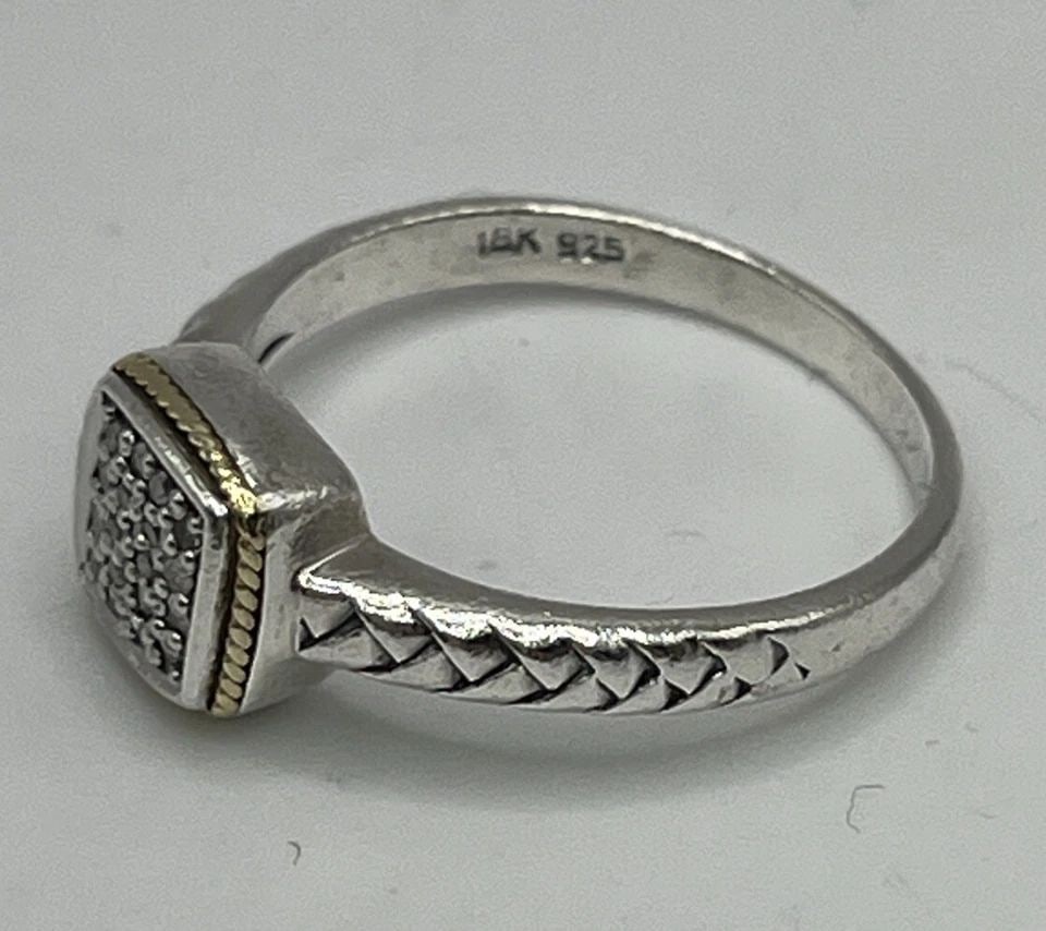 925 STERLING SILVER & 18K GOLD COGNAC DIAMOND RING SIZE 7.25: 925 STERLING SILVER & 18K GOLD COGNAC DIAMOND RING SIZE 7.25 925 STERLING SILVER & 18K GOLD COGNAC DIAMOND RING SIZE 7.25 Add a touch of elegance to your jewelry collection with this stunning ring. Cr