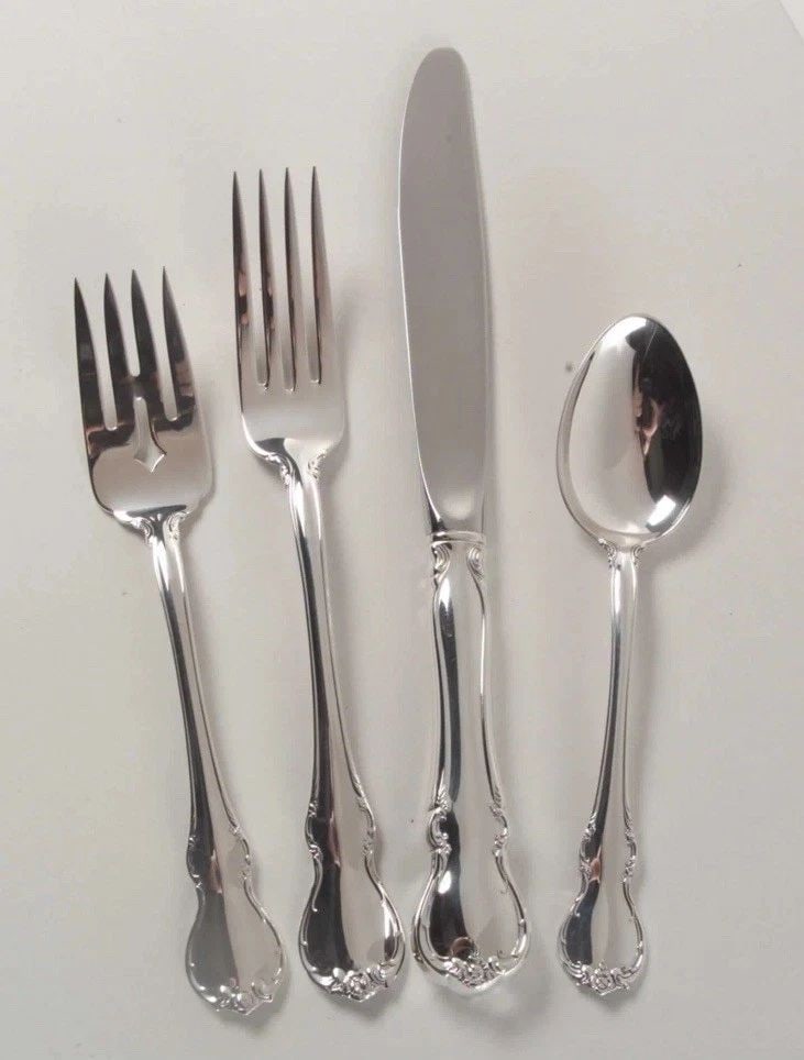 TOWLE SILVER FRENCH PROVINCIAL 4 PIECE PLACE SETTING: TOWLE SILVER FRENCH PROVINCIAL 4 PIECE PLACE SETTING The Towle Silver French Provincial 4 Piece Place Setting is a beautifully designed flatware set that exudes elegance and sophistication. Made from 