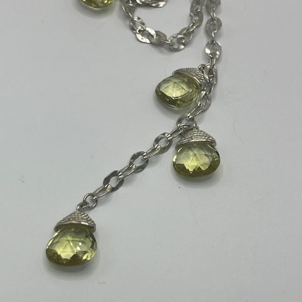 JOI STERLING SILVER 45" WRAP NECKLACE WITH GREEN STONES: JOI STERLING SILVER 45" WRAP NECKLACE WITH GREEN STONES JOI STERLING SILVER 45" WRAP NECKLACE WITH GREEN STONES The Joi Sterling Silver 45" Wrap necklace features four green stones set in sterling sil