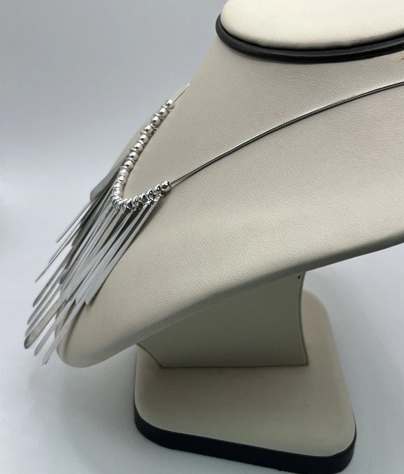 ADJUSTABLE FANCY STERLING SILVER NECKLACE: ADJUSTABLE FANCY STERLING SILVER NECKLACE ADJUSTABLE FANCY STERLING SILVER NECKLACE Elevate your style with this stunning adjustable necklace made of high-quality 925 sterling silver. The necklace exu