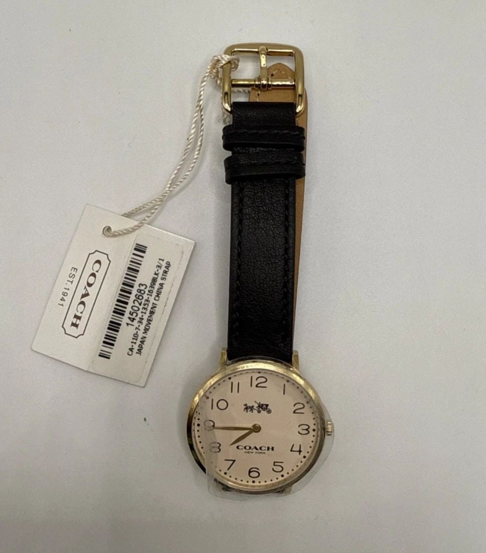 COACH 14502683 EASTON GOLD TONE DIAL BLACK LEATHER STRAP WOMEN'S WATCH: COACH 14502683 EASTON GOLD TONE DIAL BLACK LEATHER STRAP WOMEN'S WATCH The Coach 14502683 Easton women's watch features a sleek black leather strap and a stylish gold tone dial. This modern quartz wat