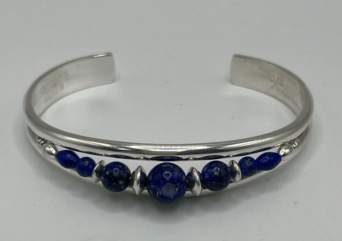 SERGIO LUB STERLING SILVER HANDMADE STERLING SILVER BLUE STONE CUFF BRACELET: SERGIO LUB STERLING SILVER HANDMADE STERLING SILVER BLUE STONE CUFF BRACELET SERGIO LUB STERLING SILVER HANDMADE STERLING SILVER BLUE STONE CUFF BRACELET This exquisite handmade cuff bracelet by Sergi