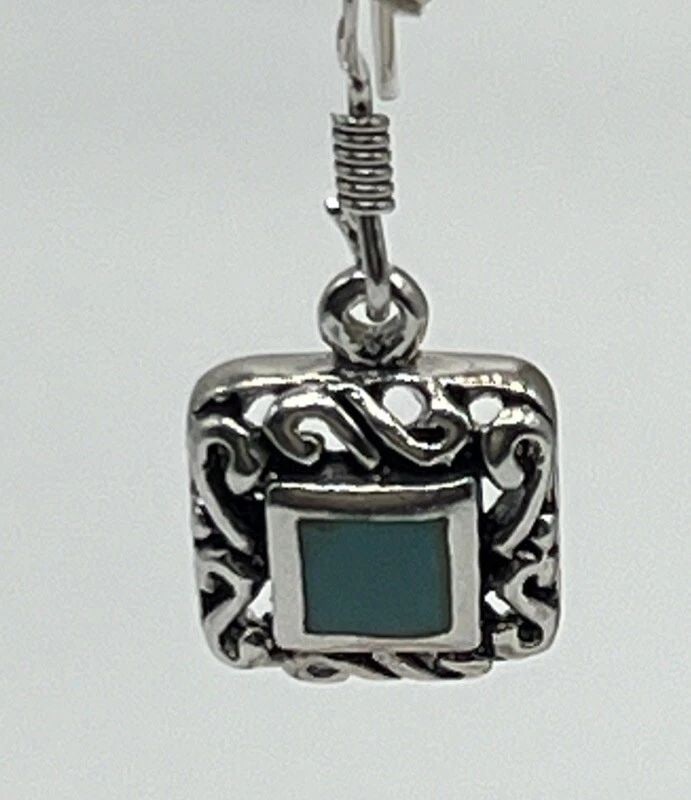 STERLING SILVER AND TURQUOISE DANGLE/HANGING EARRINGS: STERLING SILVER AND TURQUOISE DANGLE/HANGING EARRINGS STERLING SILVER AND TURQUOISE DANGLE/HANGING EARRINGS Add a touch of elegance to your jewelry collection with these beautiful Sterling Silver and 