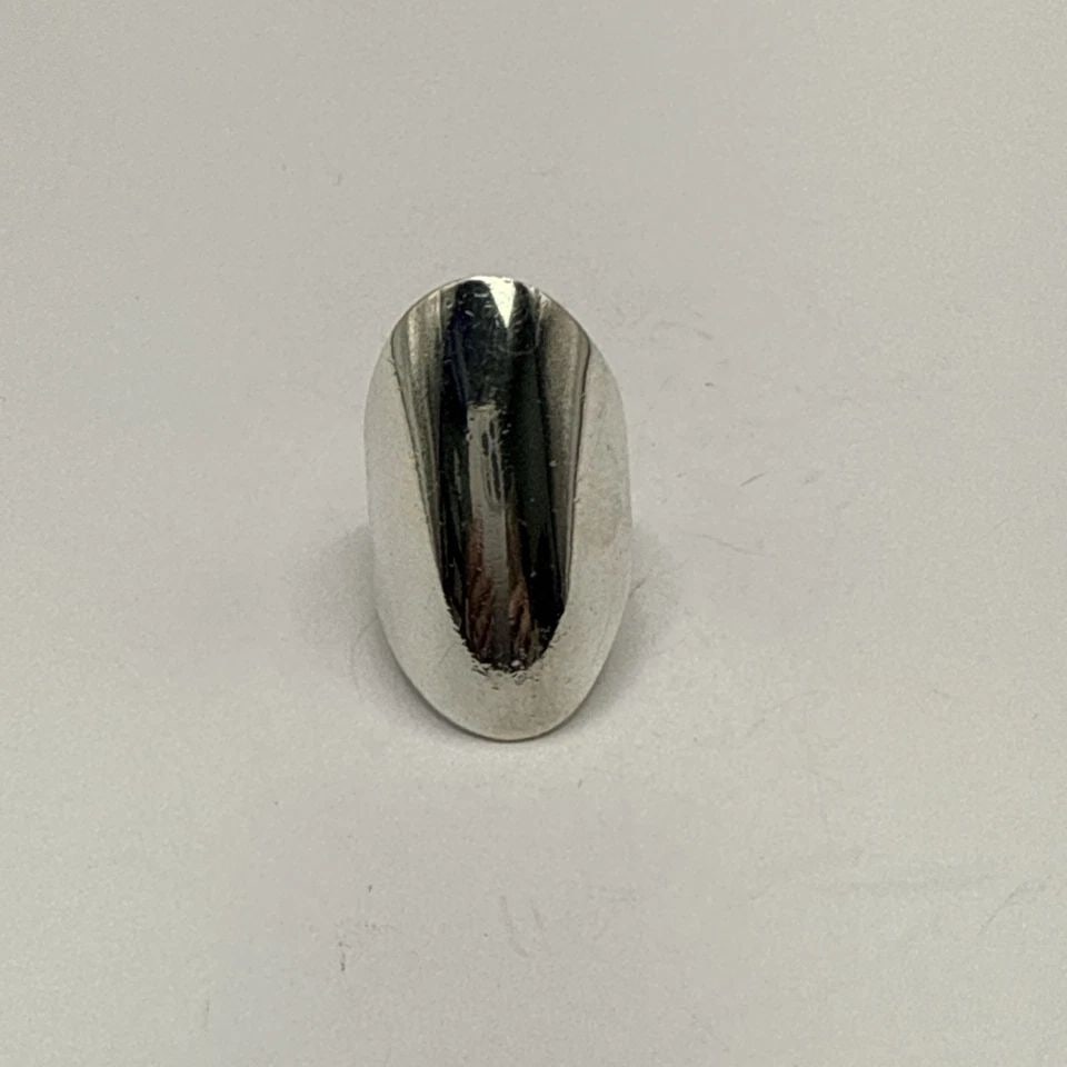 STERLING SILVER ELONGATED RING SIZE 5.25: STERLING SILVER ELONGATED RING SIZE 5.25 STERLING SILVER ELONGATED RING SIZE 5.25 Crafted with a refined aesthetic, this Sterling Silver Elongated Ring captures sophistication in its seamless design.