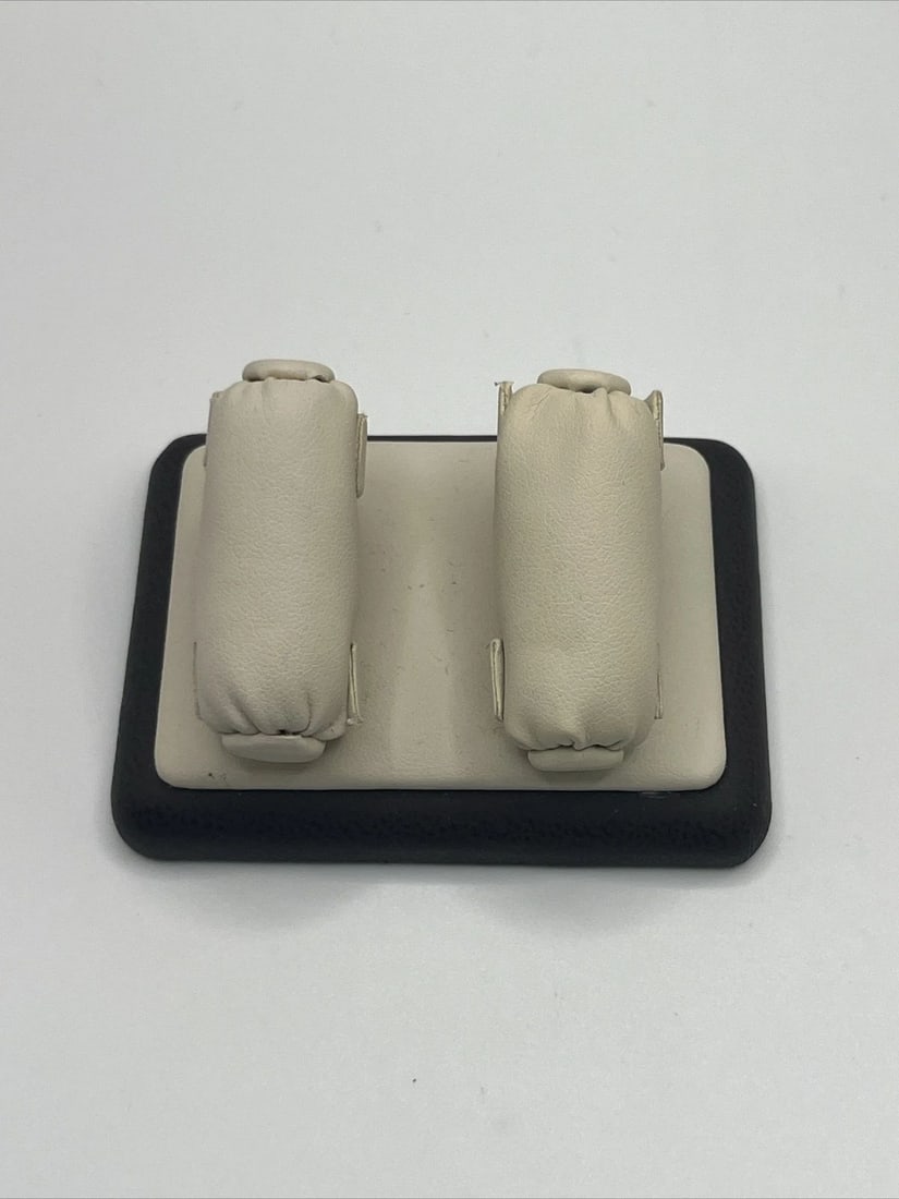 DOUBLE CUSHION RING DISPLAY UNIT: DOUBLE CUSHION RING DISPLAY UNIT DOUBLE CUSHION RING DISPLAY UNIT This Double Cushion Ring Display Unit is the perfect solution for showcasing your jewelry collection. Crafted with utmost precision,