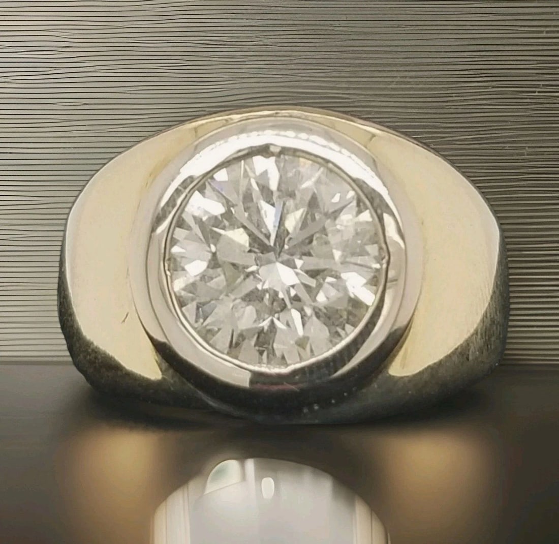 5.24ct. Natural Round Carat Diamond Statement Unisex Ring 14K Yellow Gold: 5.24CT. NATURAL ROUND CARAT DIAMOND STATEMENT UNISEX RING 14K YELLOW GOLD A bold and powerful statement piece crafted in solid 14K yellow gold, designed for the distinguished gentleman. At the center 