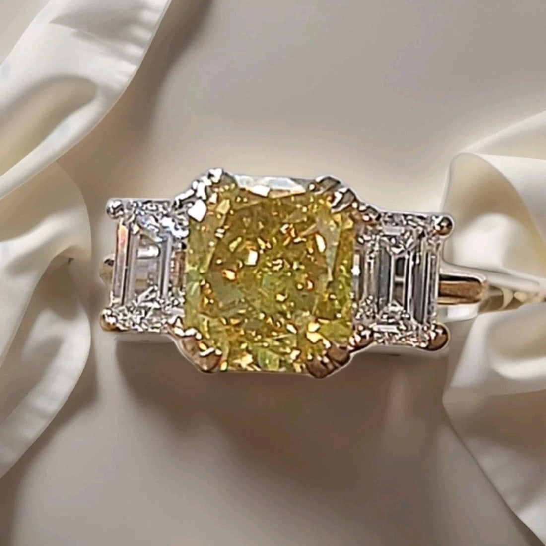 Vintage 14K White Gold Engagement Ring 3.71CT.Natural Yellow Radiant Diamond GIA: VINTAGE 14K WHITE GOLD ENGAGEMENT RING 3.71CT.NATURAL YELLOW RADIANT DIAMOND GIA This vintage 14K white gold engagement ring features a stunning 3.71CT natural yellow radiant diamond certified by GIA.
