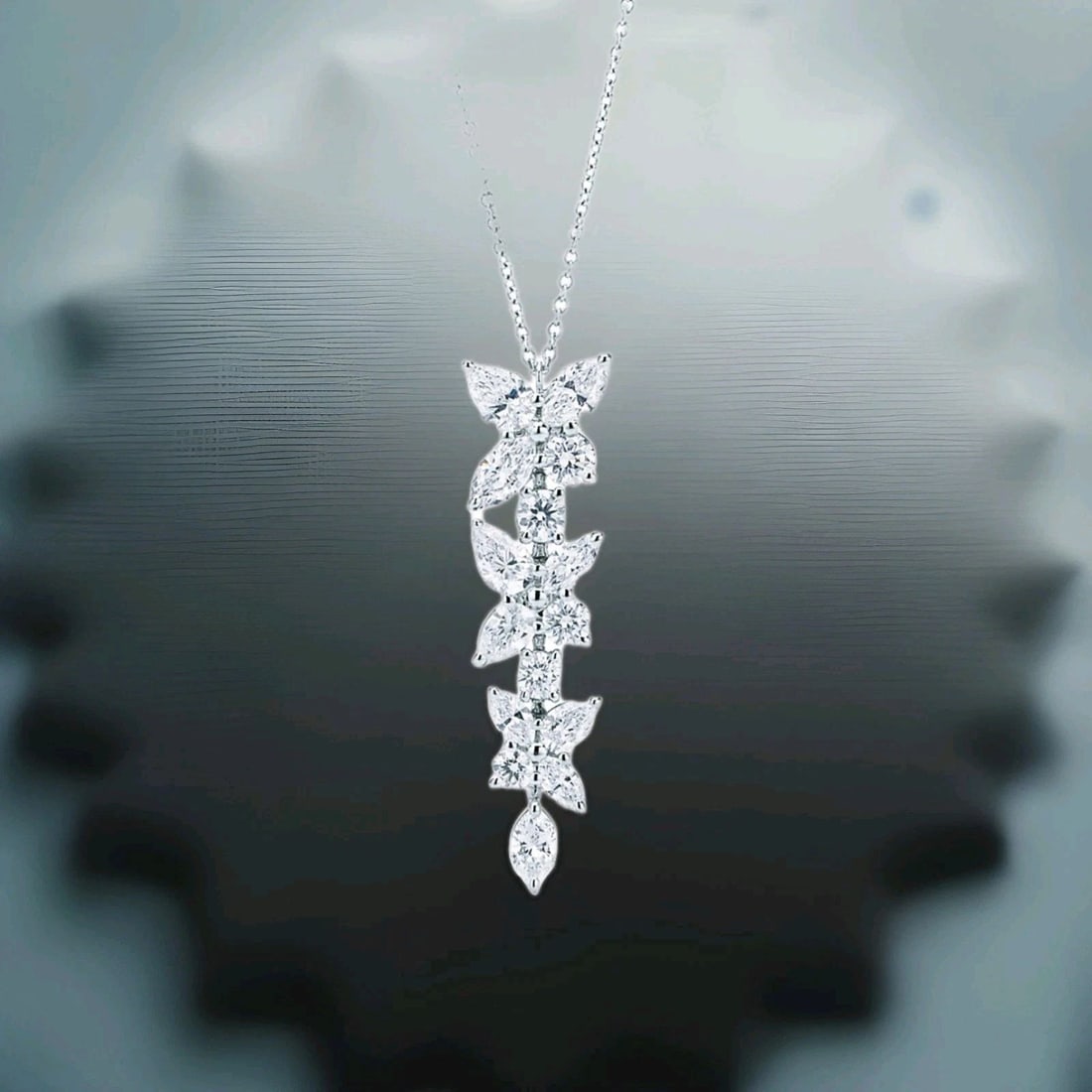 Tiffany & Co. Victoria Mixed Cluster Drop Pendant 2.12ct. F-VS: TIFFANY & CO. VICTORIA MIXED CLUSTER DROP PENDANT 2.12CT. F-VS Inspired by the fire and radiance of our superlative diamonds, Tiffany Victoria uses a unique combination of cuts for a distinctly romant